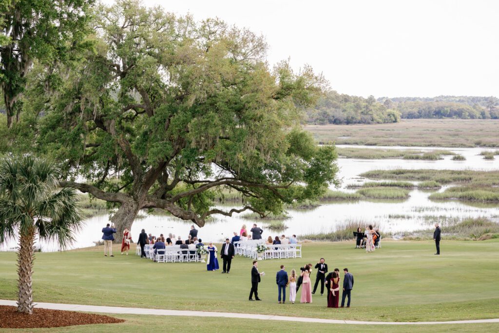 Outdoor ceremony setup beneath a live oak at a Dataw Island wedding in South Carolina Lowcountry