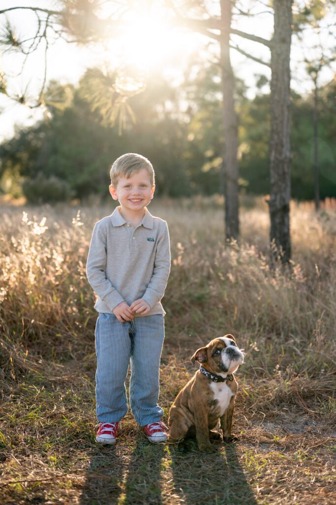 Child portrait with dog during Lake Louisa State Park Clermont family session in natural light