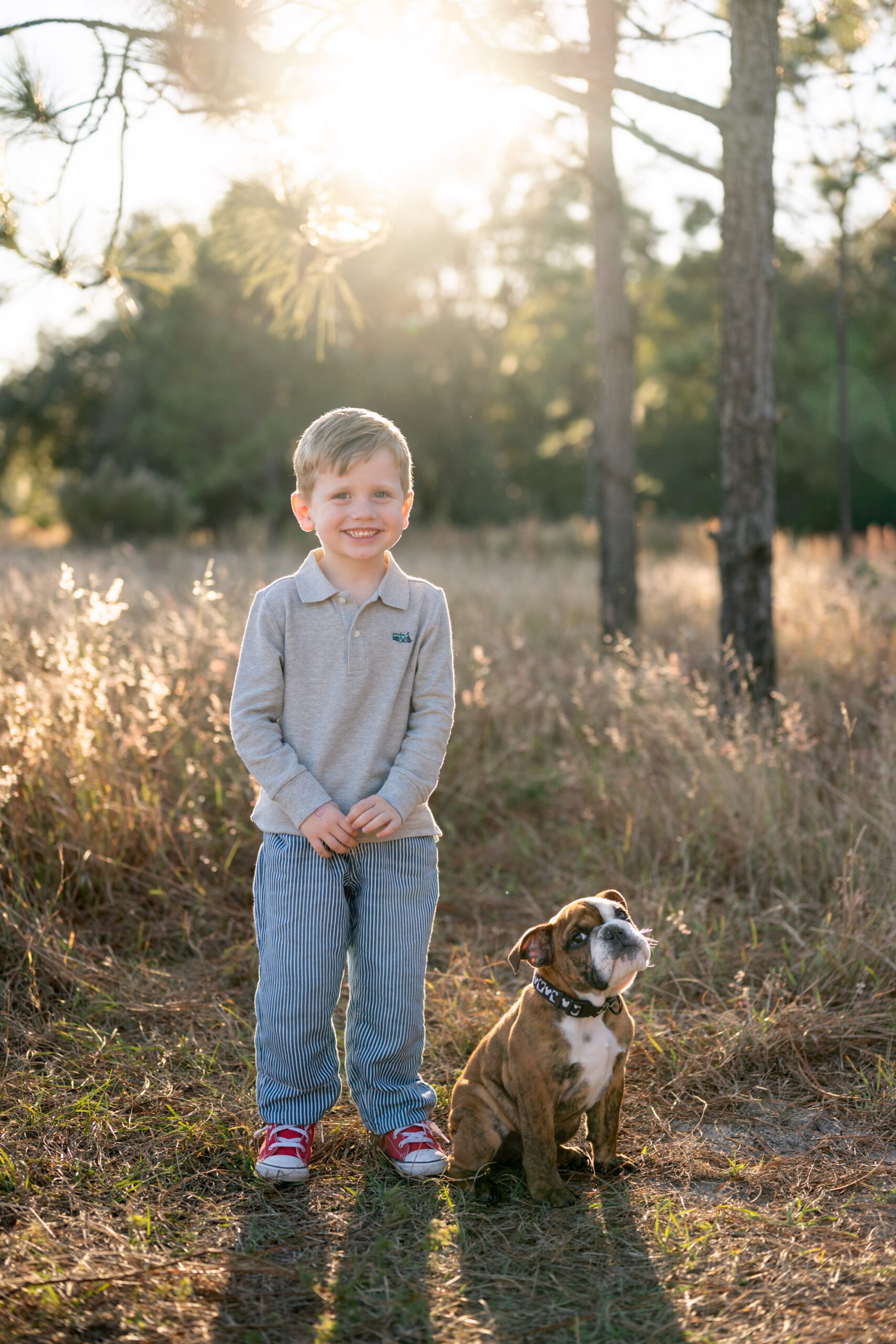Child portrait with dog during Lake Louisa State Park Clermont family session in natural light
