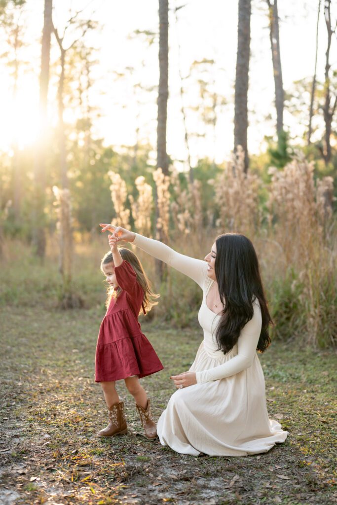 Mother and daughter during Moss Park Orlando FL family session at golden hour in natural light