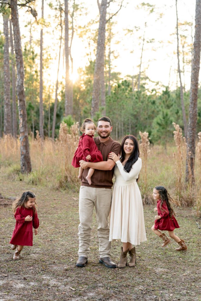 Moss Park Orlando family photos with parents and children in natural light outdoor setting
