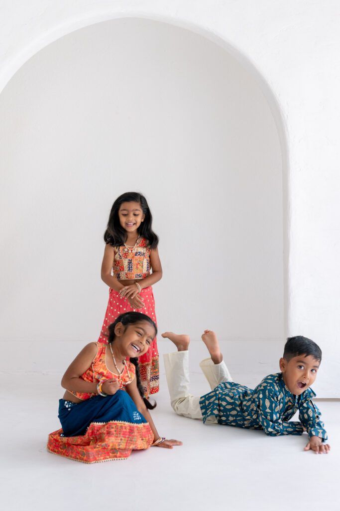 Children playing during indoor family photo session at Orlando studio family photography session